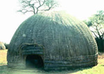 A bee-hive hut in the royal enclosure at the Old Bulawayo
